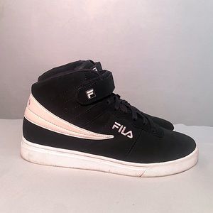 Matte black and pink Fila high-top sneakers with white soles.